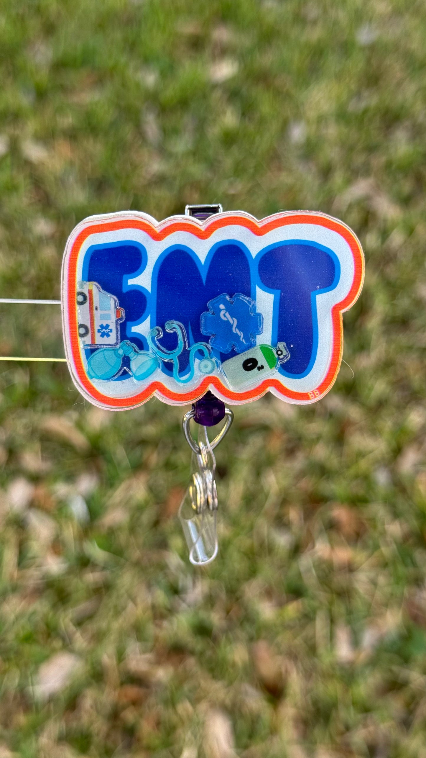 EMT shaker badge reel for emergency medical technicians and first responders