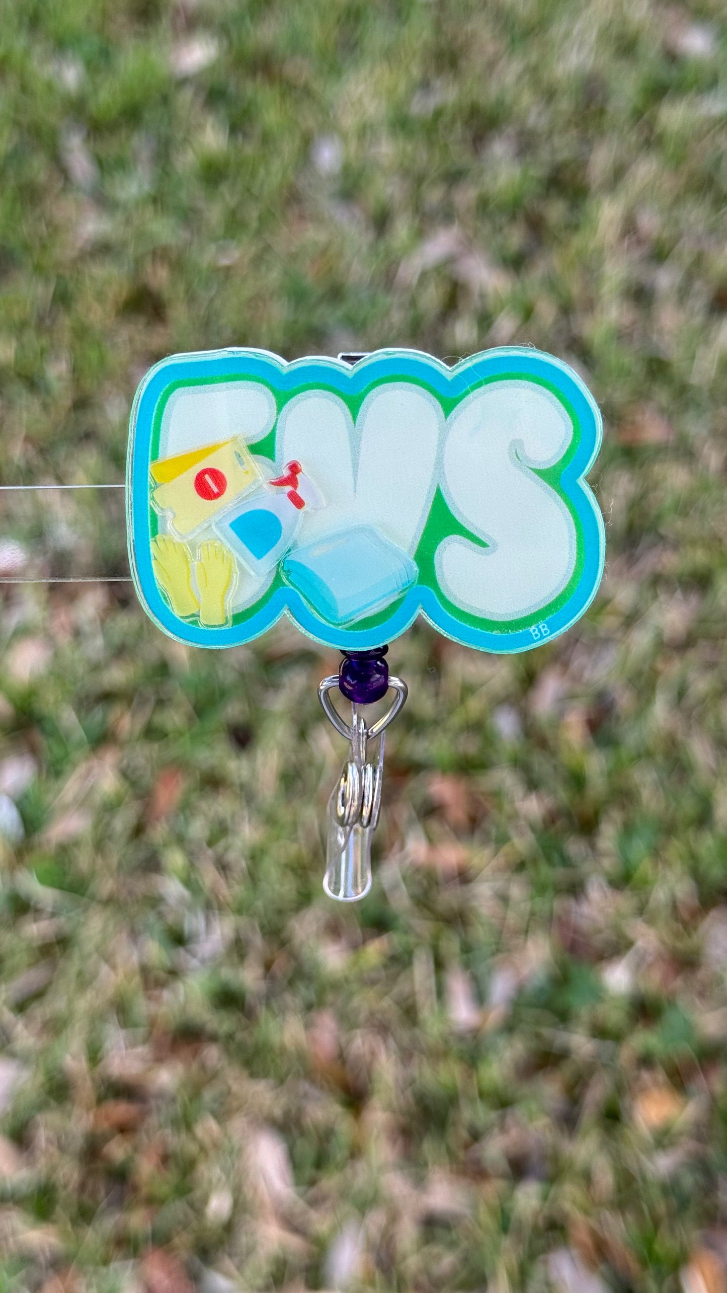 EVS shaker badge reel for environmental services technicians and hospital housekeeping staff