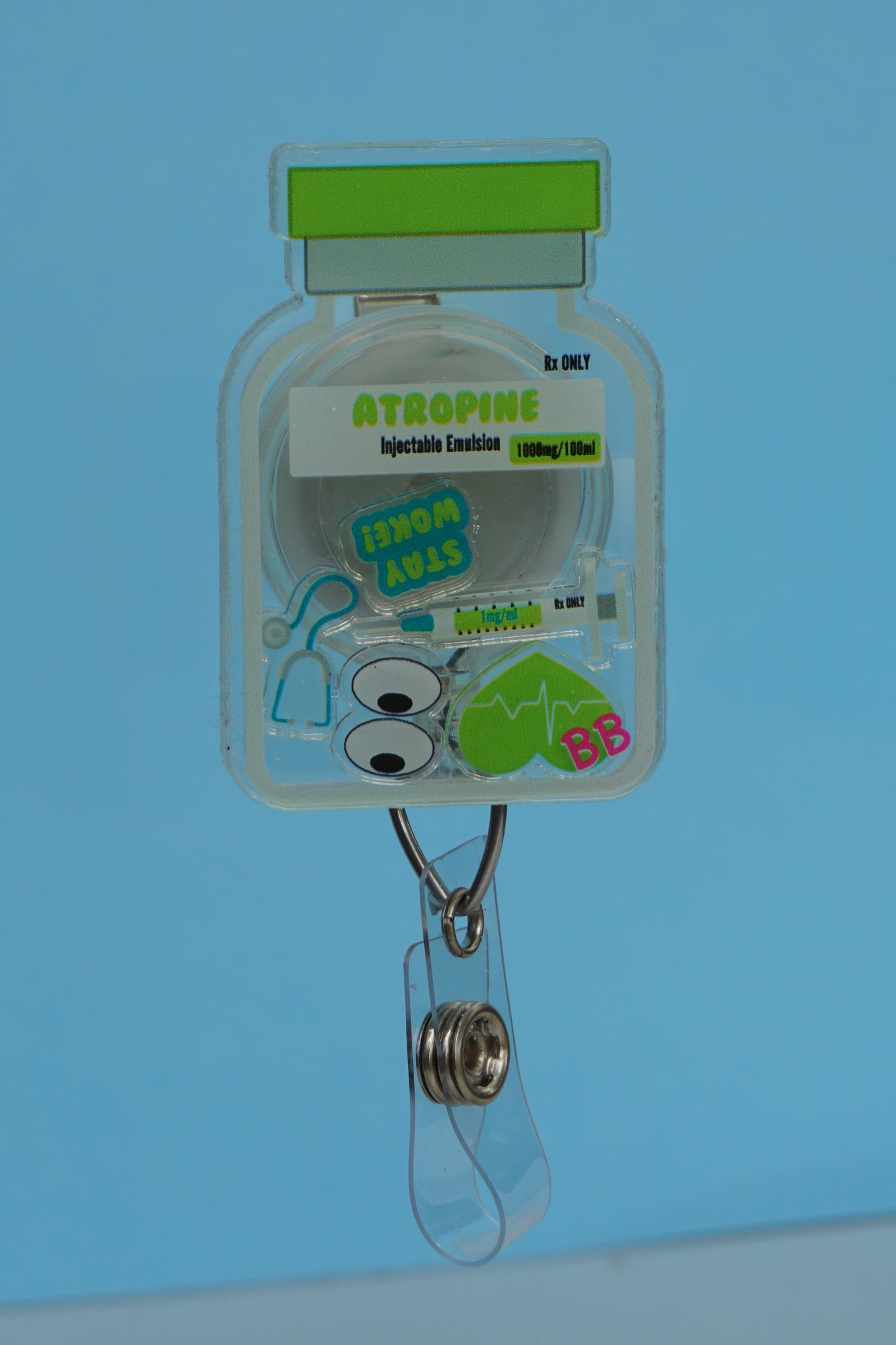 Atropine vial shaker badge reel