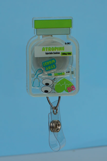 Atropine vial shaker badge reel