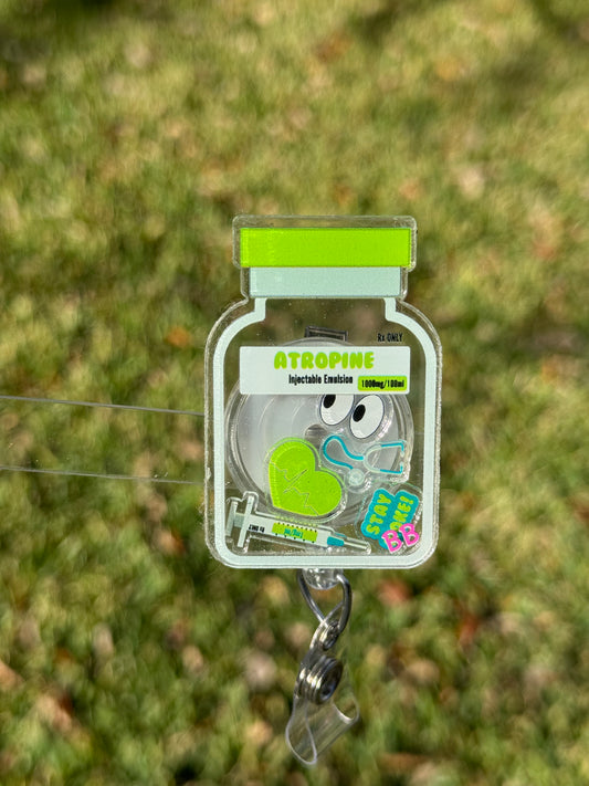 Atropine vial shaker badge reel